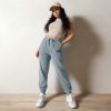 Gary Taxali "Bye" on unisex pigment-dyed sweatpants - artist designed clothing by Gary Taxali
